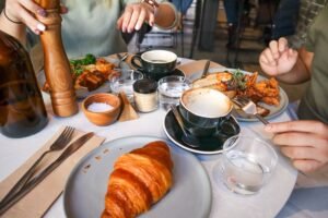 Coffee and breakfast spread at a cozy Delhi cafe for students